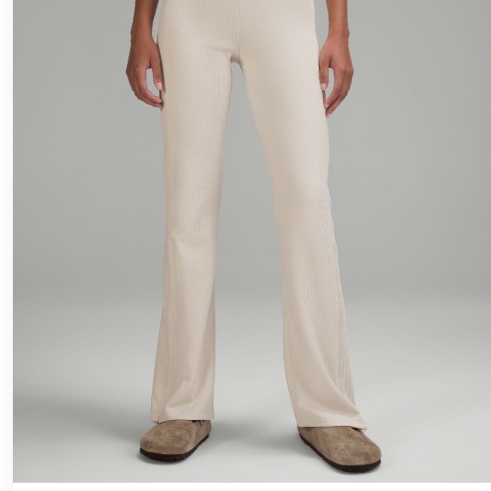 Lululemon Athletica Brushed Softstreme Ribbed Zip Flared Pant 32.5"
White Opal